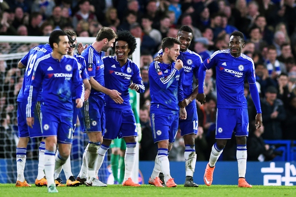 Eden Hazard (third right) of Chelsea is congratulated by teammates 