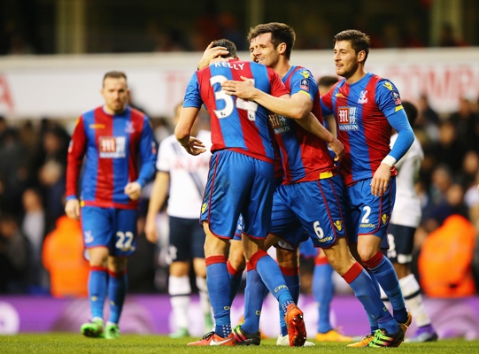 Martin Kelly of Crystal Palace is congratulated by teammates 