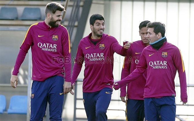 FC Barcelona's Gerard Pique, Luis Suarez, Neymar and Lionel Messi at a training session