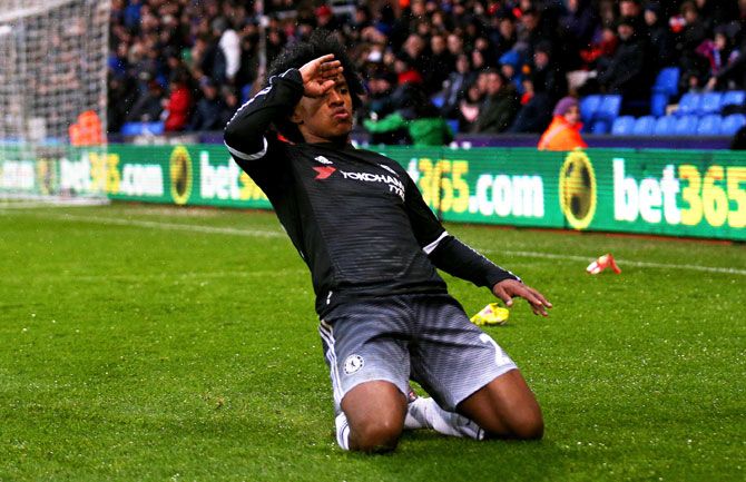 Chelsea's Willian celebrates after scoring his team's second goal against Crystal Palace during the Barclays Premier League match at Selhurst Park in London on Sunday
