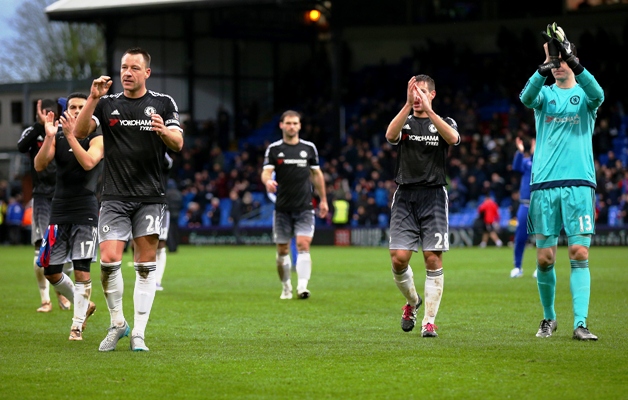 John Terry of Chelsea and his team-mates applaud the fans 