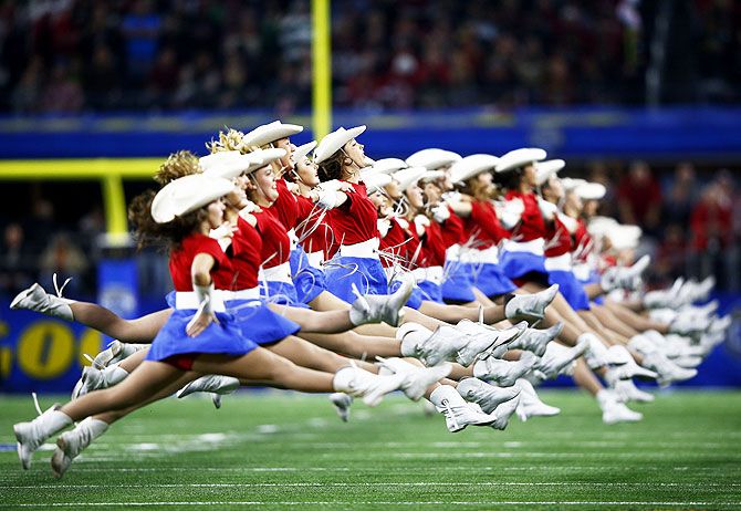 Dancers perform prior to the Goodyear Cotton Bowl between the Alabama Crimson Tide and the Michigan State Spartans at AT&T Stadium in Arlington, Texas, on Thursday, December 31, 2015