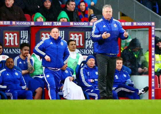Guus Hiddink, manager of Chelsea, issues instructions to his players 