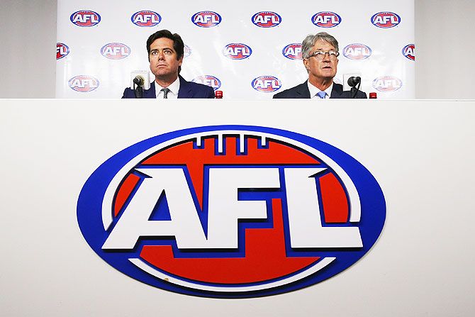 AFL Commission Chairman Mike Fitzpatrick (right) and AFL CEO Gillon McLachlan speak to media, in Melbourne, after bans were issued to 34 Aussie Rules footballers on Tuesday