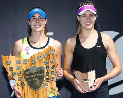 Alize Cornet of France and runner up Eugenie Bouchard of Canada pose 