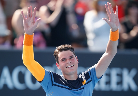 Milos Raonic of Canada celebrates winning his second round match against Tommy Robredo of Spain 