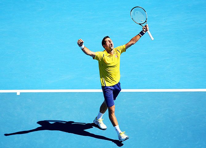 Serbia's Novak Djokovic celebrates a point in his fourth round match against France's Gilles Simon at the 2016 Australian Open at Melbourne Park on Sunday