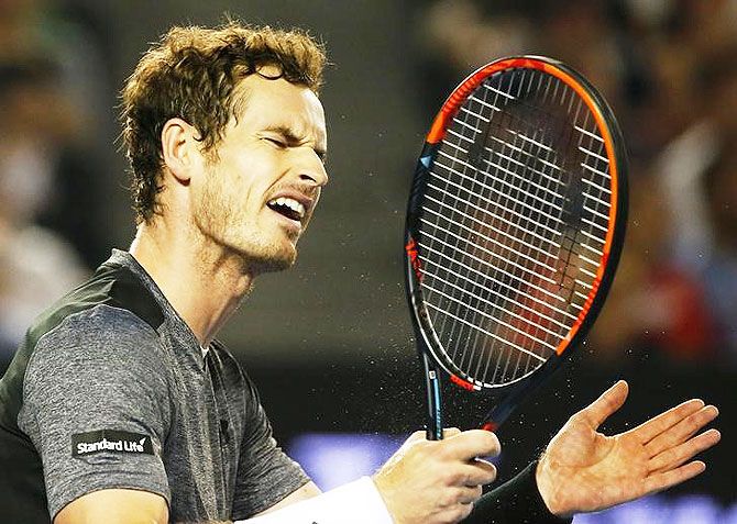 Britain's Andy Murray reacts during his fourth round match against Australia's Bernard Tomic at the Australian Open tennis tournament at Melbourne Park on Monday