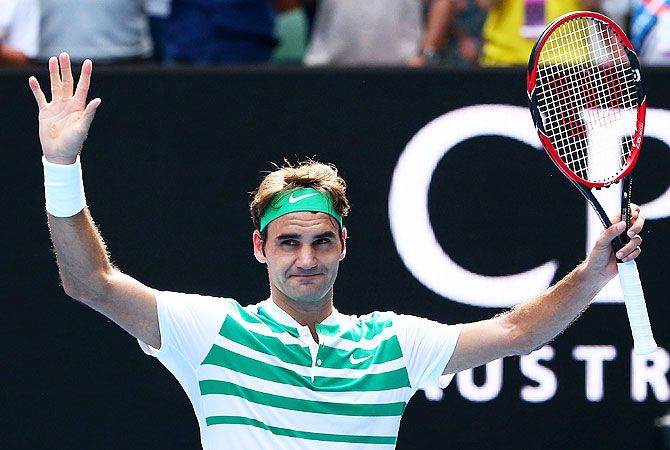 IMAGE: Switzerland's Roger Federer celebrates winning his quarter-final match against Czech Republic's Tomas Berdych on Tuesday