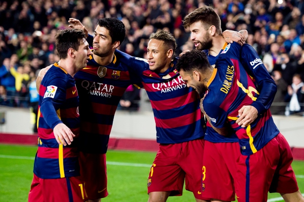 Lionel Messi, Luis Suarez, Neymar Santos Jr and Dani Alves of FC Barcelona celebrate 