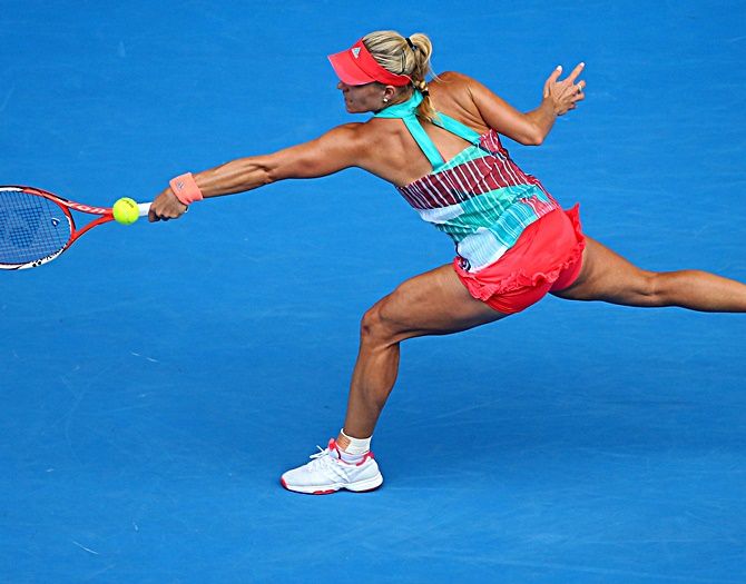 Germany's Angelique Kerber plays a backhand 