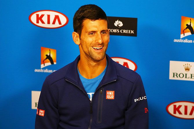 Serbia's Novak Djokovic talks to the media ahead of his Men's Singles Final match against Great Britain's Andy Murray