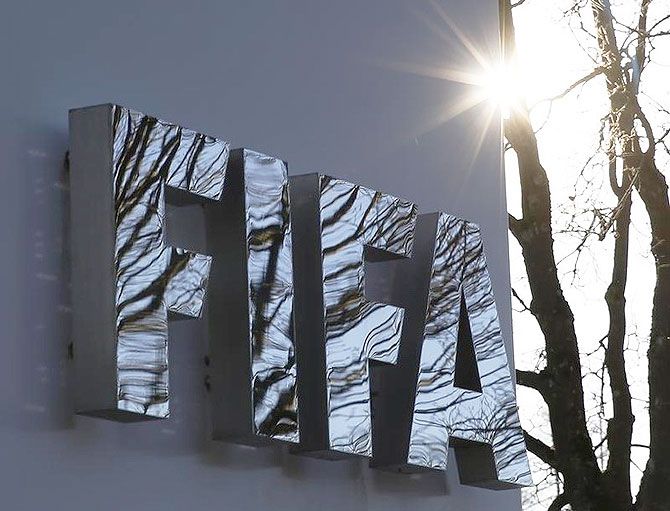 The FIFA logo is seen outside the FIFA headquarters in Zurich