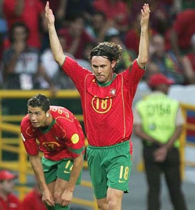  Maniche celebrates after scoring the second goal against Holland 