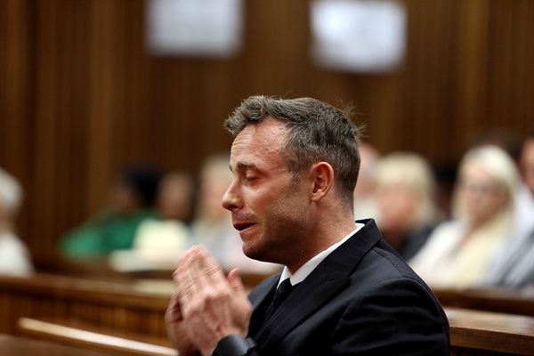 Oscar Pistorius reacts during his resentencing