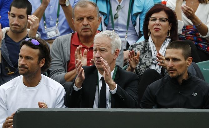 John McEnroe (centre) acknowledges Serena's mental fortitude despite his critical remarks about his compatriot