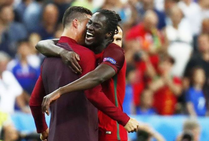 Portugal's Cristiano Ronaldo and Eder celebrate after winning Euro 2016