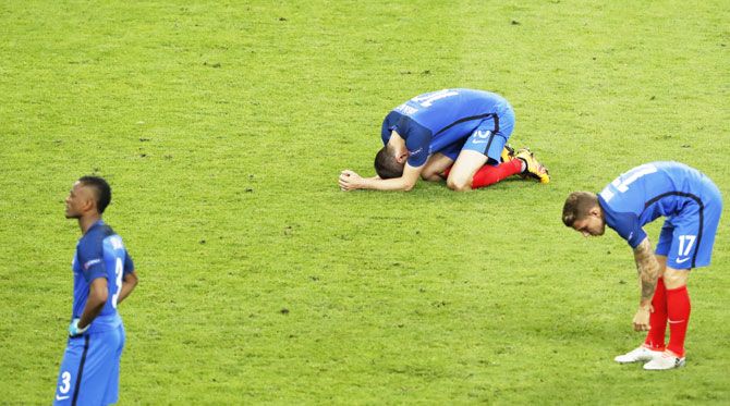 France's Andre-Pierre Gignac, Lucas Digne and Patrice Evra are a dejected lot after the Euro final