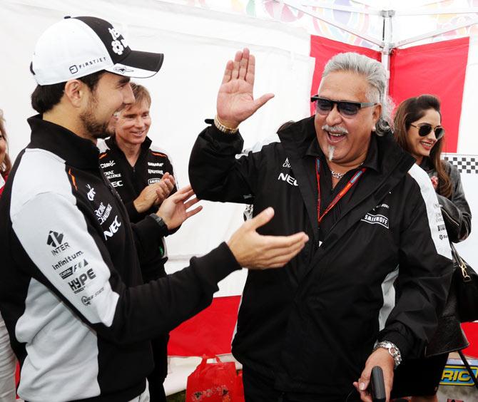 Sahara Force India F1 team owner Vijay Mallya, right, with Sergio Perez