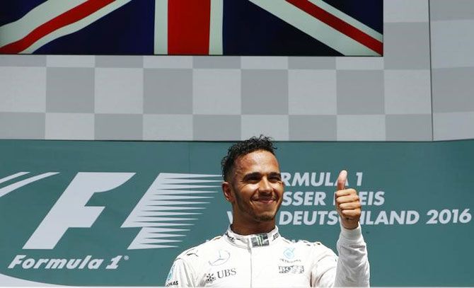 Mercedes' Lewis Hamilton gives thumb up after winning the German F1 Grand Prix on Sunday