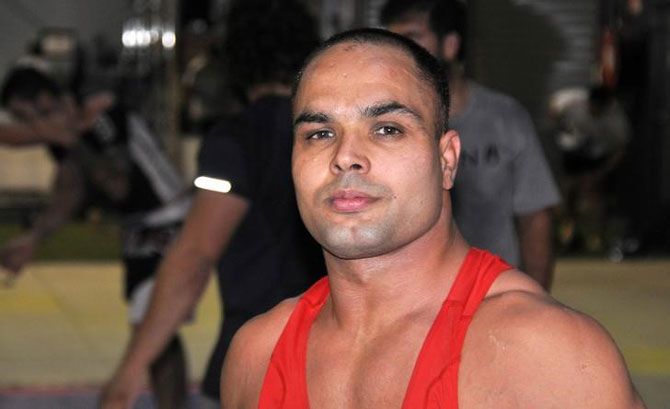 Vinod Kumar was a teenager competing in India's wrestling circuit when he was nearly killed by family of rival wrestler