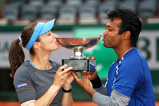 Martina Hingis and Leander Paes after winning the mixed doubles crown at the 2016 French Open