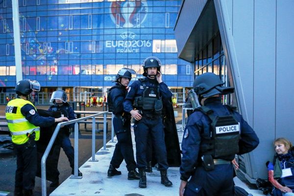 French Police forces take part in a mock attack drill outside the Grand Stade stadium near Lyon in preparation of security measures for the UEFA European Championship
