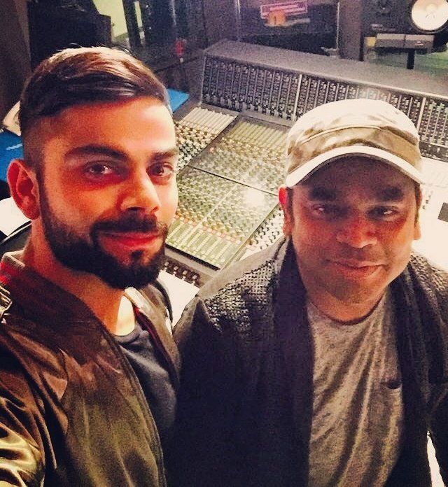 India cricketer Virat Kohli and AR Rahman pose for a self as they work together for an anthem for Premier Futsal League