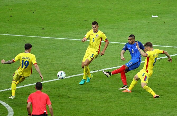 IMAGE: France's Dimitri Payet scores his team's second goal against Romania in the opening game of Euro 2016 in Paris, June 11, 2016. Photograph: Paul Gilham/Getty Images