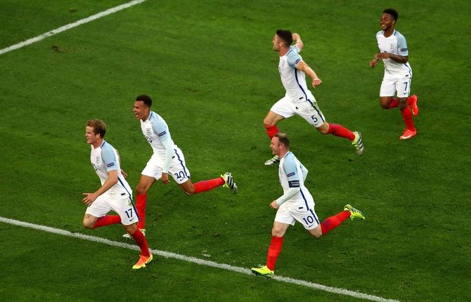 Eric Dier (left) of England celebrates with teammates after scoring a goal against Russia at Euro 2016