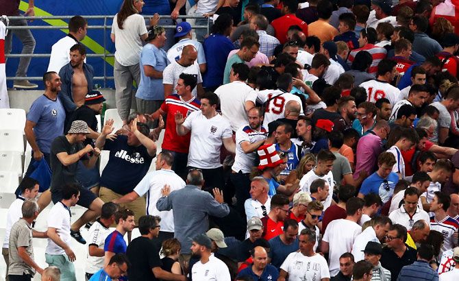 Fans clash after the UEFA EURO 2016 Group B match between England and Russia at Stade Velodrome in Marseille, on Saturday, June 11