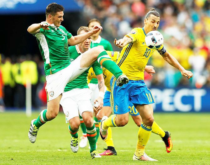  Sweden's Zlatan Ibrahimovic in action against Republic of Ireland's Ciaran Clark during their Euro 2016, Group E match Stade de France, Saint-Denis near Paris on Monday