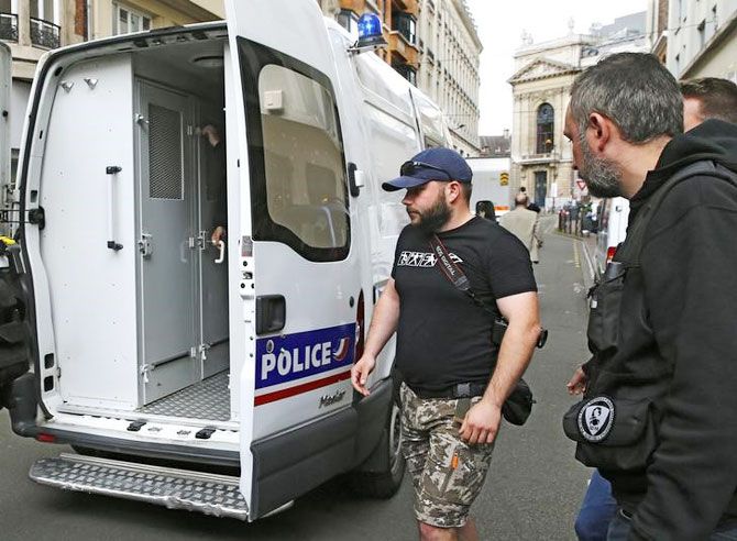 A Russian supporter is detained by police in Lille on Wednesday