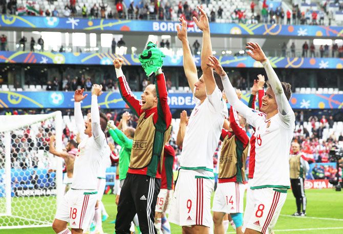 Hungary players Adam Szalai celebrate after their team's 2-0 win over Austria at the Euro 2016 Group F match at Stade Matmut Atlantique on Tuesday