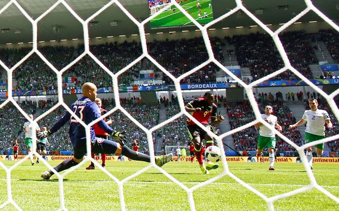 Belgium's Romelu Lukaku scores his team's third goal past Republic of Ireland's keeper Darren Randolph