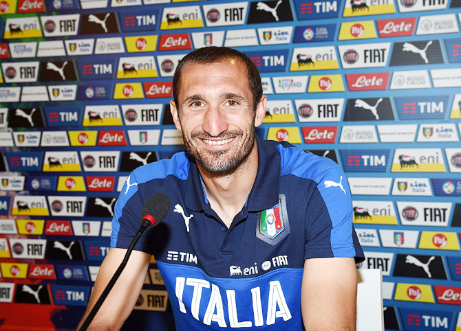 Italy's Giorgio Chiellini speaks with the media during a press conference