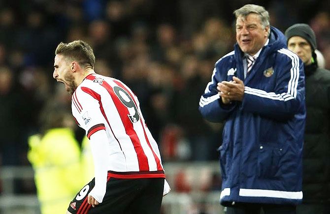 Fabio Borini celebrates with manager Sam Allardyce after scoring the second goal for Sunderland against Crystal Palace at the Stadium of Light in Sunderland on Tuesday