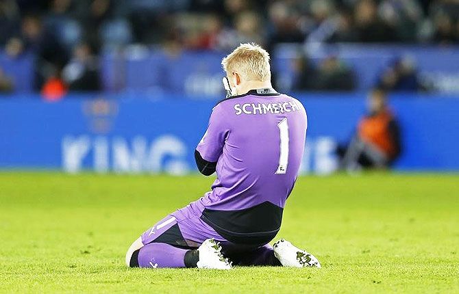 Leicester City's 'keeper Kasper Schmeichel looks dejected after he lets in a goal