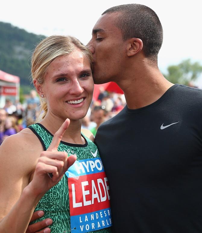 Brianne Theisen Eaton of Canada embraces Ashton Eaton