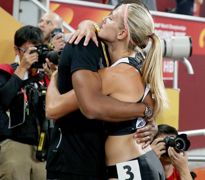 Brianne Theisen Eaton of Canada embraces Ashton Eaton