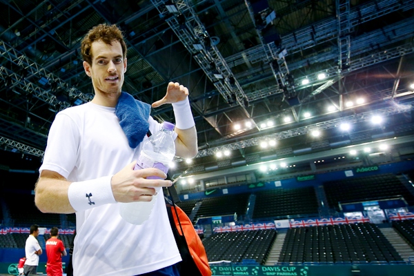 Andy Murray of Great Britain walks off court after a practice session 