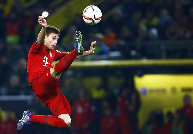 Bayern Munich's Joshua Kimmich attempts to score against Borussia Dortmund during their Bundesliga match at Signal Uduna Park in Dortmund on Saturday