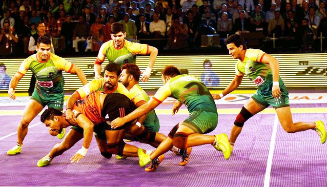 Players of U Mumba and Patna Pirates in action during the Pro Kabaddi final in New Delhi on Saturday
