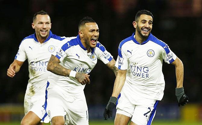 Riyad Mahrez celebrates with teammates after scoring the first goal for Leicester against Watford during their English Premier League match at Vicarage Road on Saturday