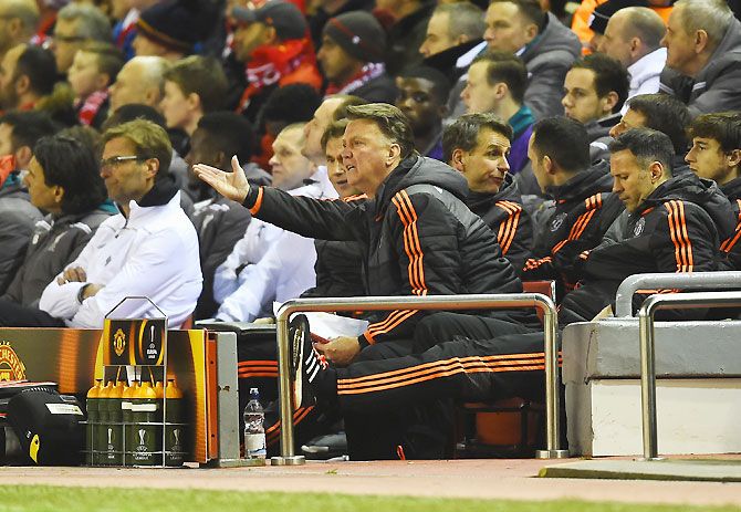 Manchester United manager Louis van Gaal reacts on the bench on Thursday