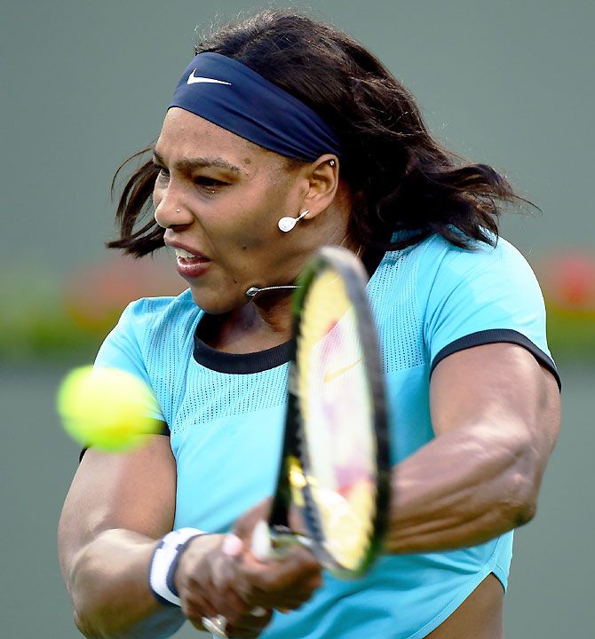 Serena Williams hits a backhand during her match against Kateryna Bondarenko of Ukraine 