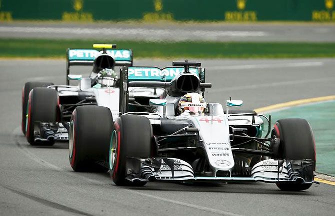 Mercedes F1 driver Lewis Hamilton leads teammate Nico Rosberg during qualifying at the Australian Formula One Grand Prix in Melbourne on Saturday
