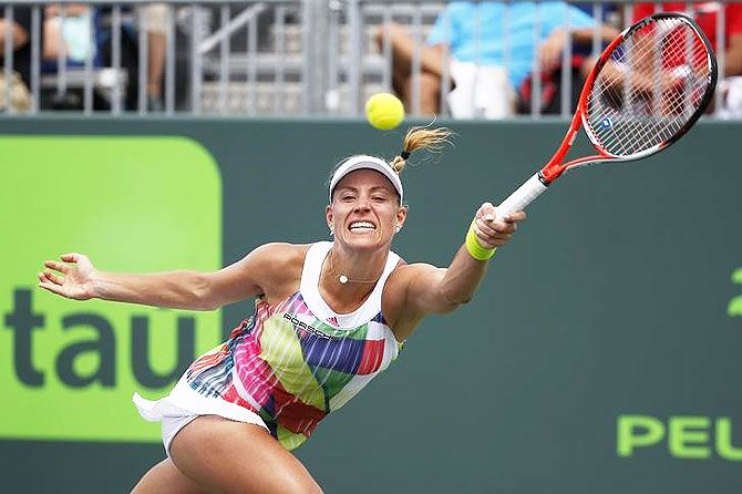 Angelique Kerber hits a forehand against Kiki Bertens during their match at the Miami Open at Crandon Park Tennis Center on Sunday