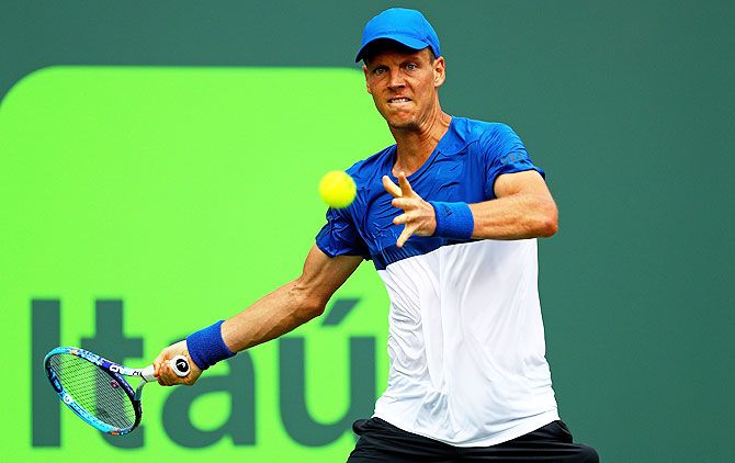 Tomas Berdych plays a forehand during his match against Richard Gasquet