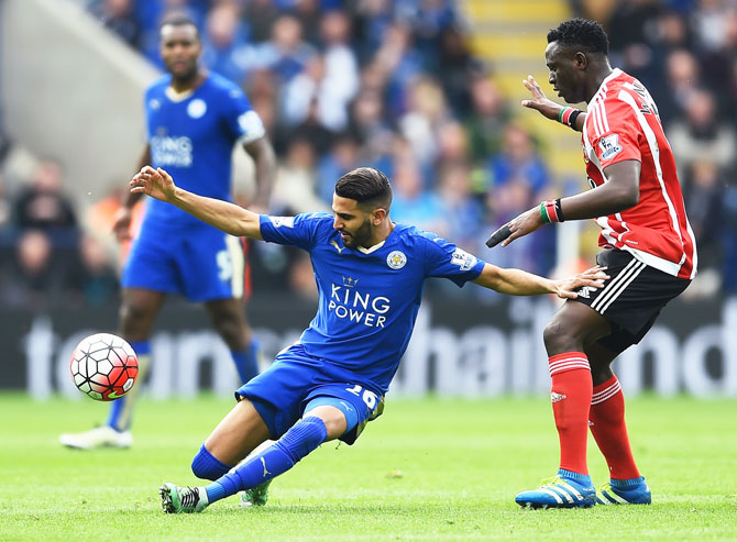 Leicester City's Riyad Mahrez holds off Southampton Victor Wanyama's challenge